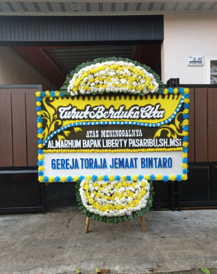 Papan Bunga Duka di Gaung